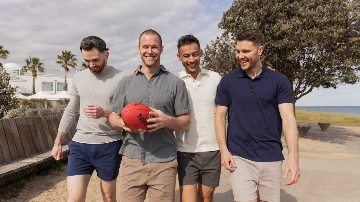 As we talk about the most attractive attire for Australian men, this image shows a group of men being active wearing a pair of Franksters shorts.
