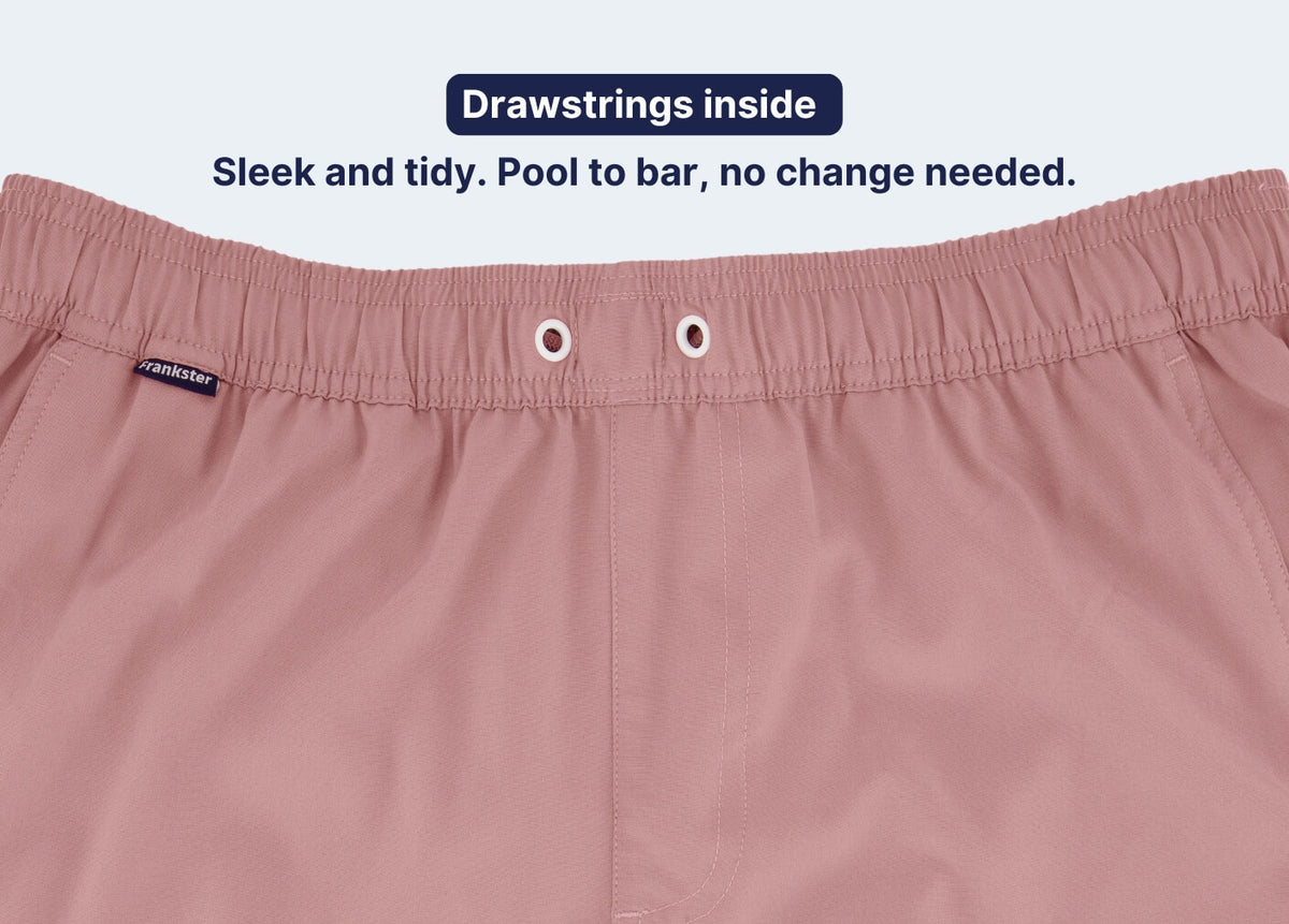 Pink Men's Shorts close-up in smooth fabric showing an elasticated waistband with concealed drawstrings and neat stitching