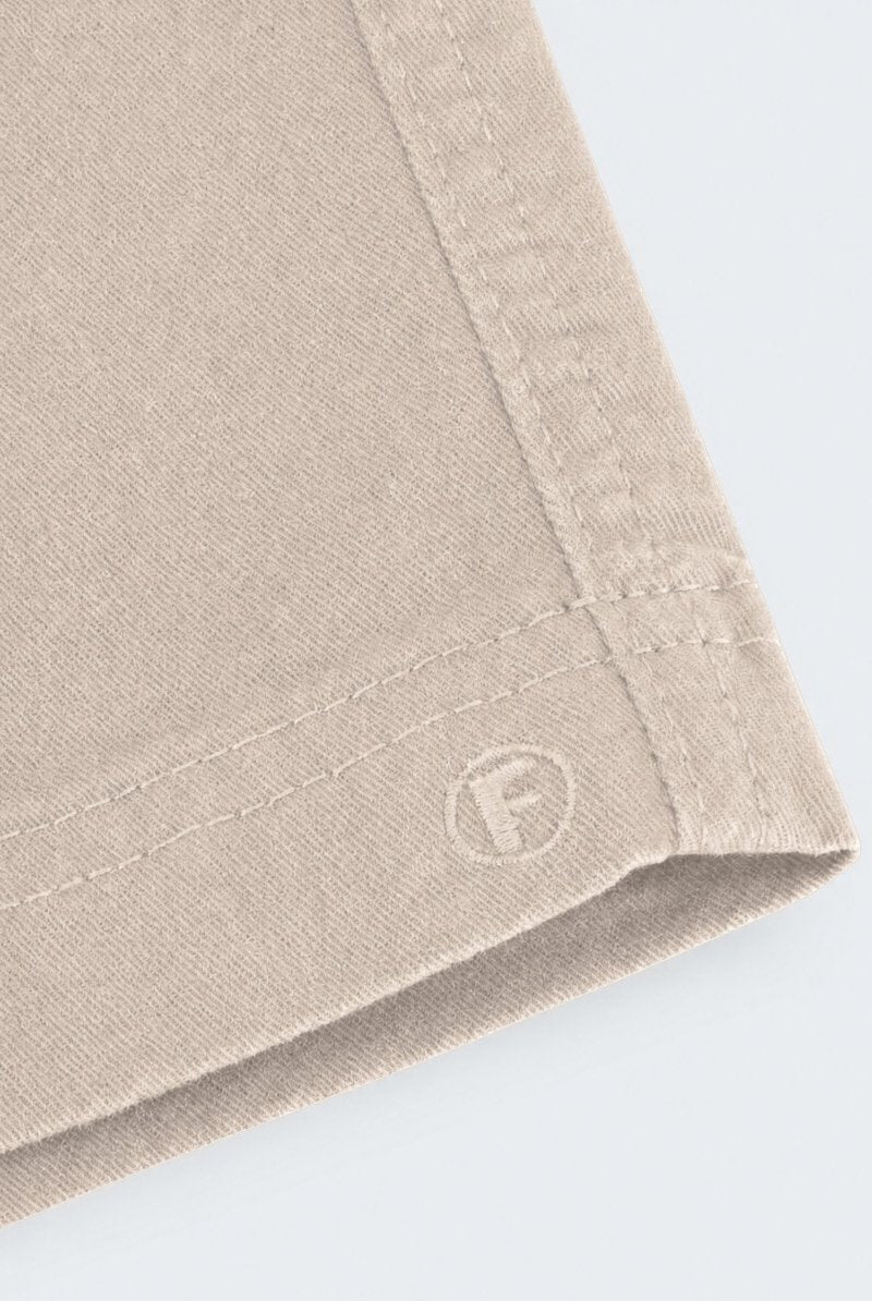 Close-up of beige Shores * The Everydays men's shorts by Frankster, showcasing soft fabric texture and detailed stitching for comfortable wear.
