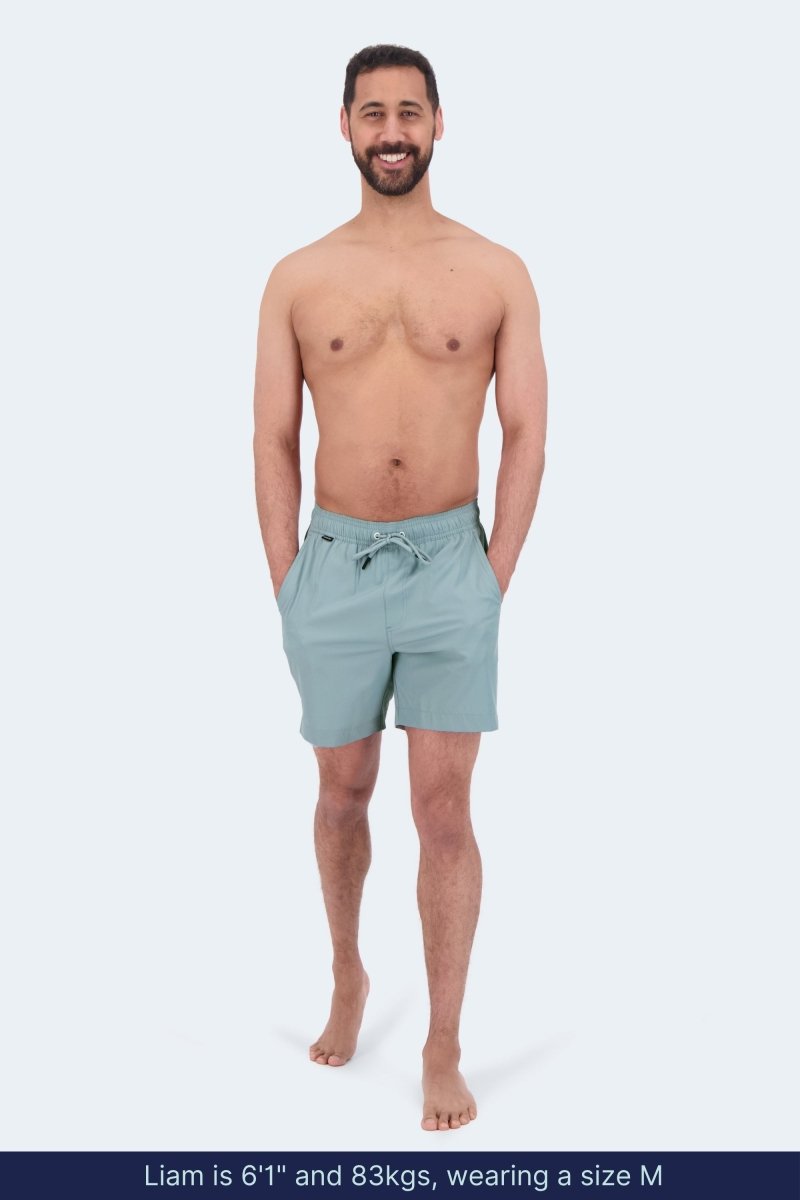 Frankster Velvets * The Swims Men's Shorts in light blue with a drawstring waist worn by a model