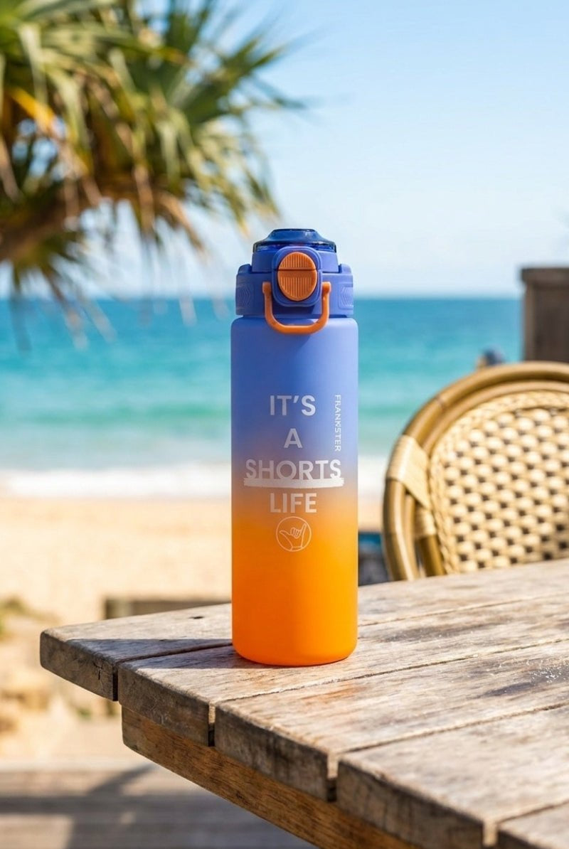 Water Bottle Orange Blue with a vibrant blue and orange gradient, featuring durable material perfect for outdoors, complementing casual men's shorts styles.