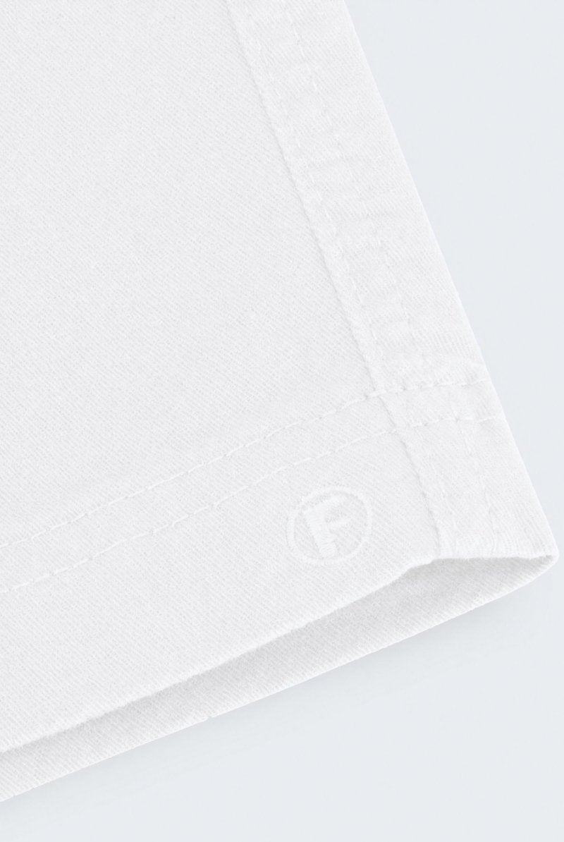 Close-up of white fabric detailing on Whitecaps * The Everydays men's shorts by Frankster, showcasing soft, durable material ideal for all-day comfort.