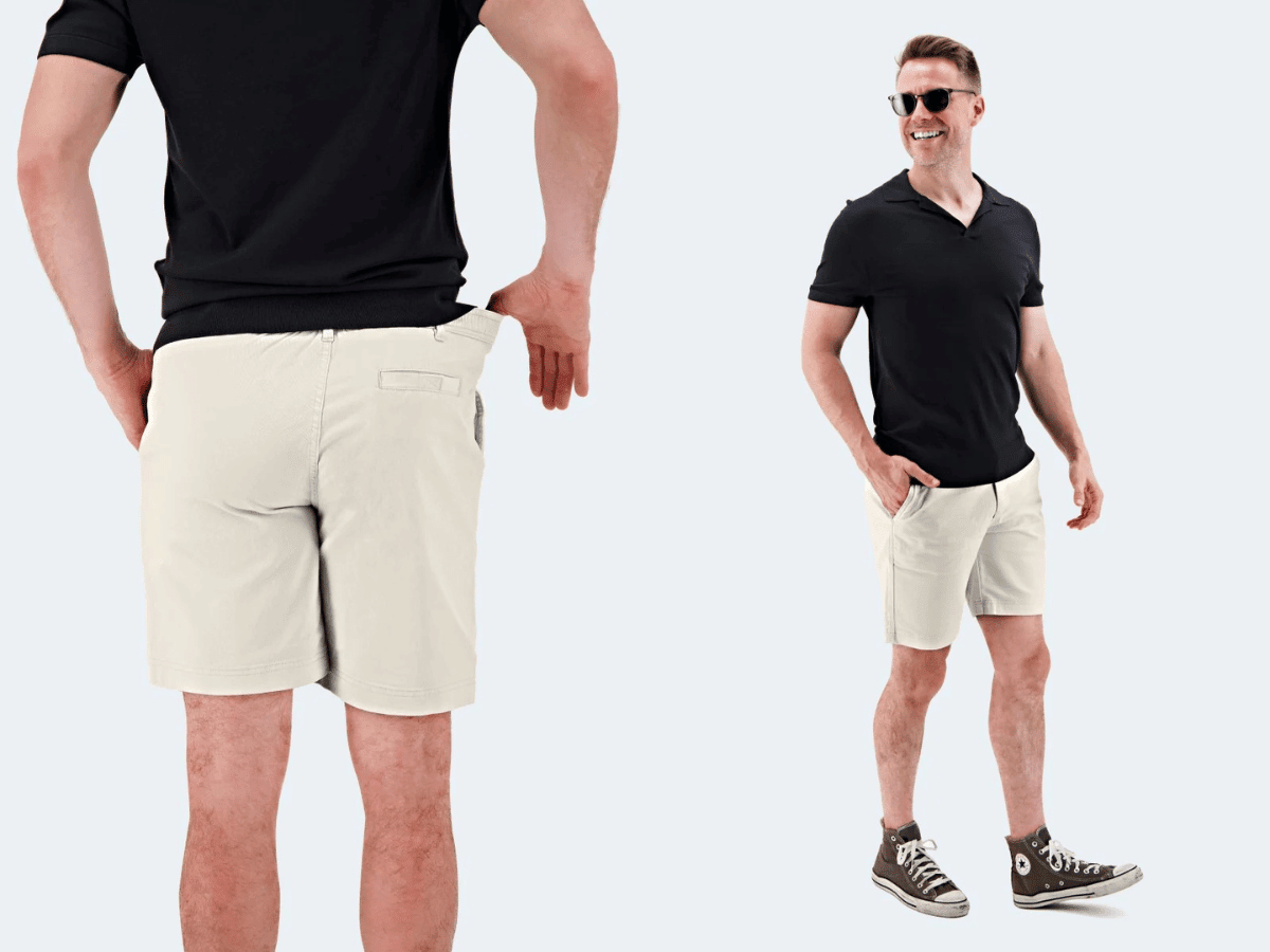 Man wearing off white stretch cotton Mirages * The Everydays men's shorts by Frankster with black shirt and sneakers outdoors
