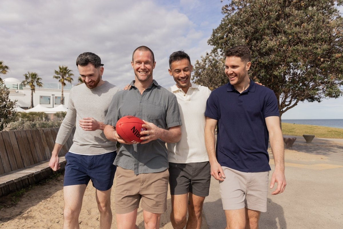 As we talk about the most attractive attire for Australian men, this image shows a group of men being active wearing a pair of Franksters shorts. 
