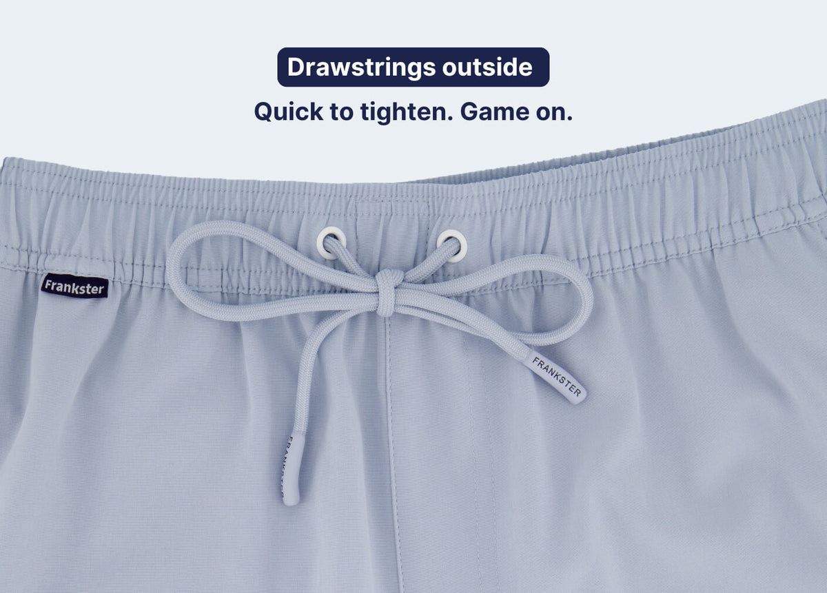 Light blue Men's Shorts with an elastic waistband and external drawstring for quick tightening close up view