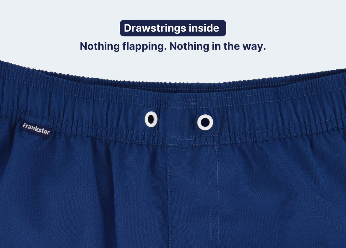 Navy Men's Shorts close-up showing an elastic waistband and internal drawstrings for a secure comfortable fit