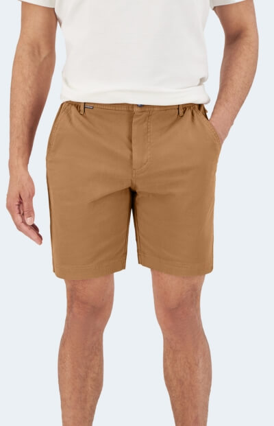 Man wearing camel brown Men's Shorts with belt loops, side pockets and a knee length cut, styled with a white T-shirt