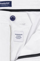 Close-up of white cotton men's shorts from Frankster, featuring a navy branded button and a clean, minimal design from the Whitecaps * The Everydays collection.