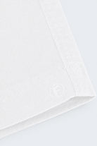 Close-up of white fabric detailing on Whitecaps * The Everydays men's shorts by Frankster, showcasing soft, durable material ideal for all-day comfort.