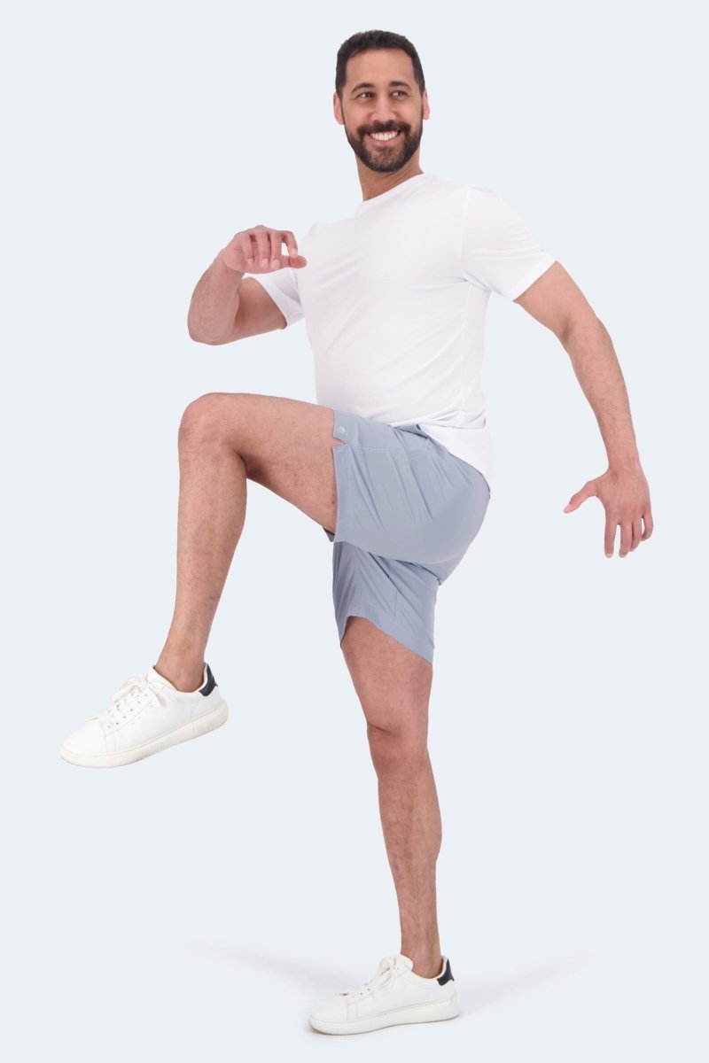 Frankster Blueprints * The Sporties Men's Shorts in light grey fabric shown on a model in a sporty pose