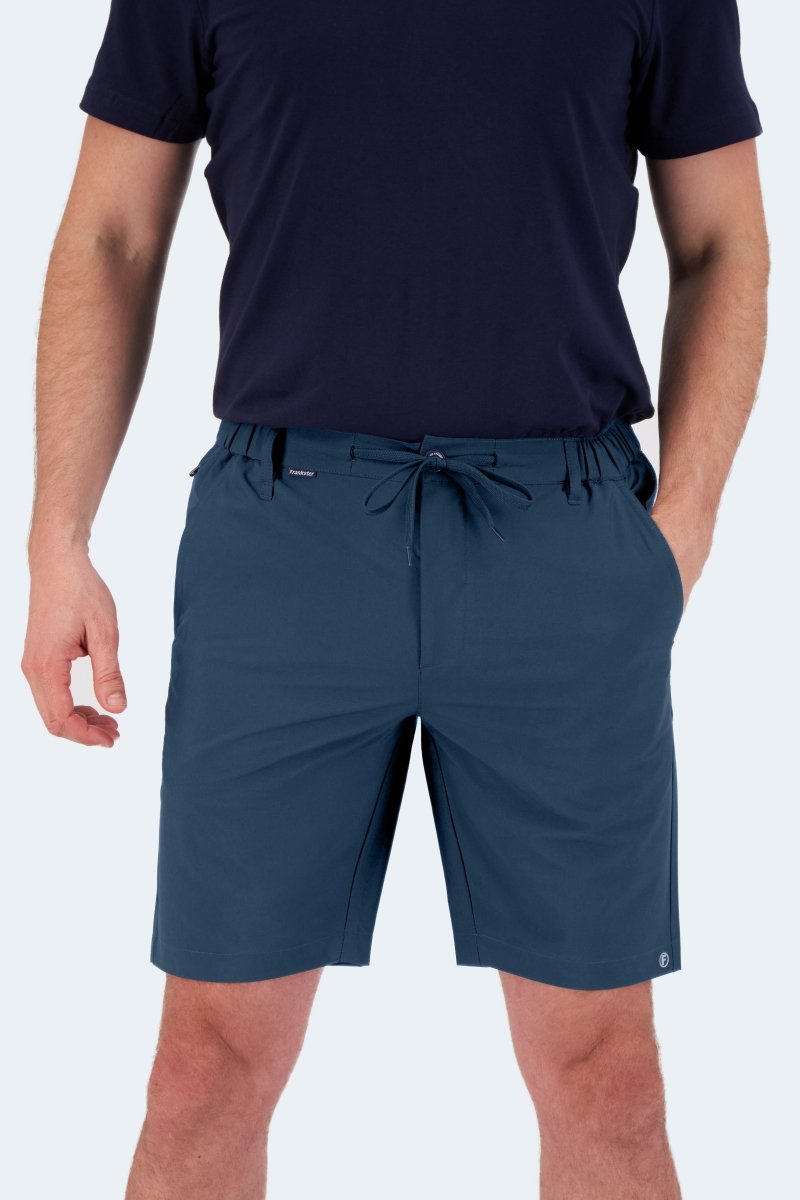 Man wearing Frankster Chillers * The Actives dark blue lightweight men's shorts with drawstring waist and pockets