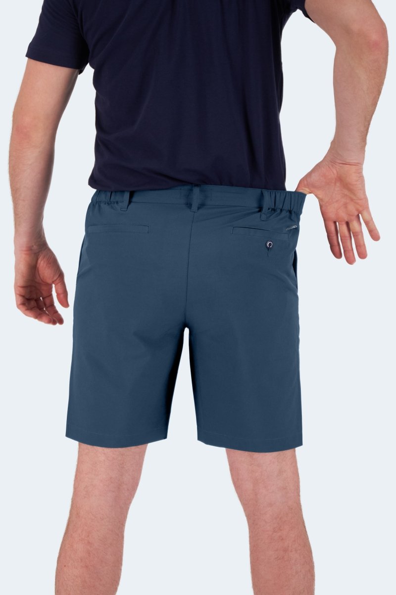 Man wearing dark blue Frankster Chillers * The Actives men's shorts made of lightweight breathable material showing elastic waistband