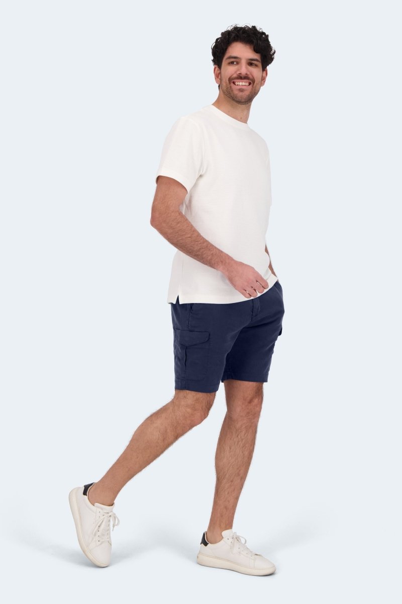 Man wearing Frankster Chillers * The Aussies dark blue premium cotton cargo men's shorts with white sneakers and t-shirt