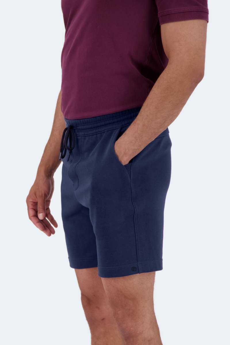 Man wearing Frankster Chillers * The Comfies dark blue cotton men's shorts with drawstring waist and side pockets