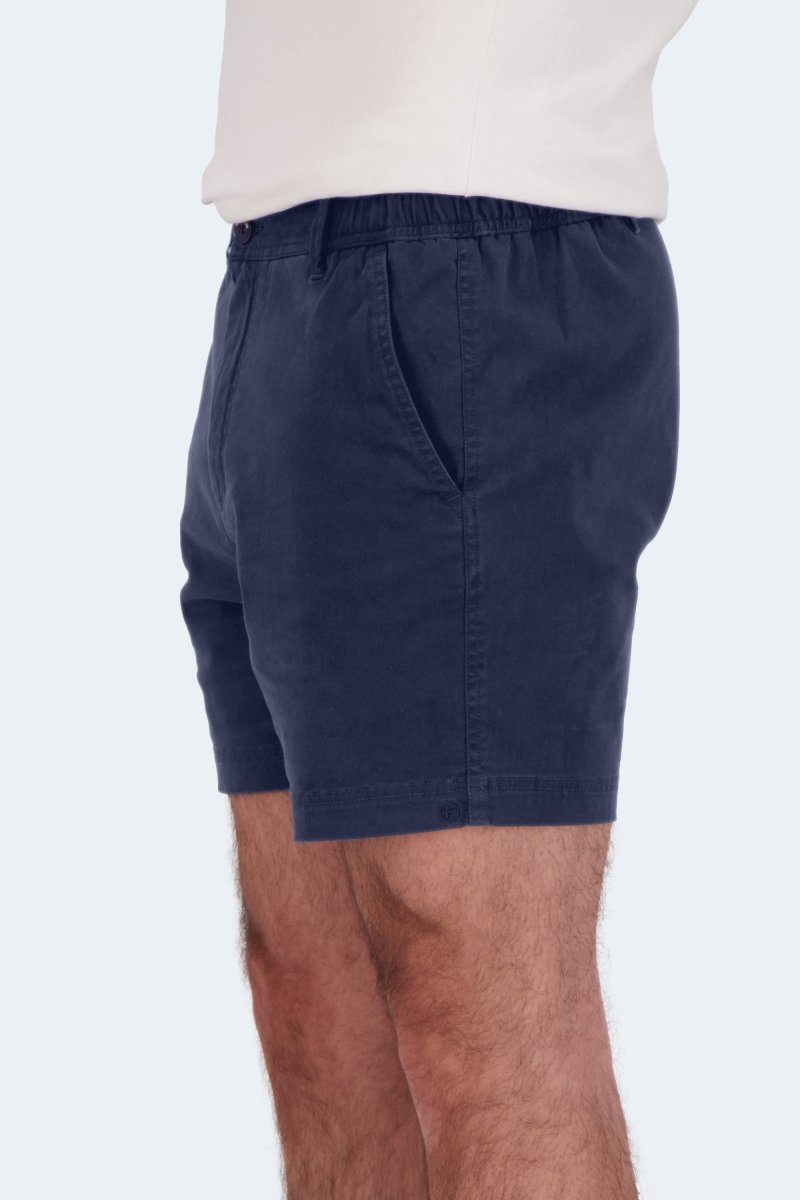 Side view of man wearing Frankster Chillers * The Shorties dark blue stretch cotton men's shorts with elastic waistband