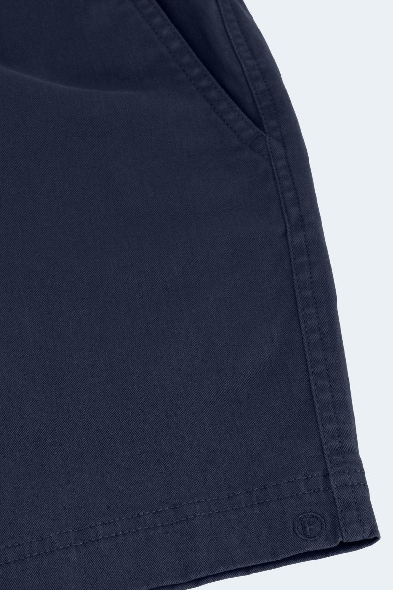 Close-up of Frankster Chillers * The Shorties men's shorts in dark blue stretch cotton fabric showing pocket and stitching details
