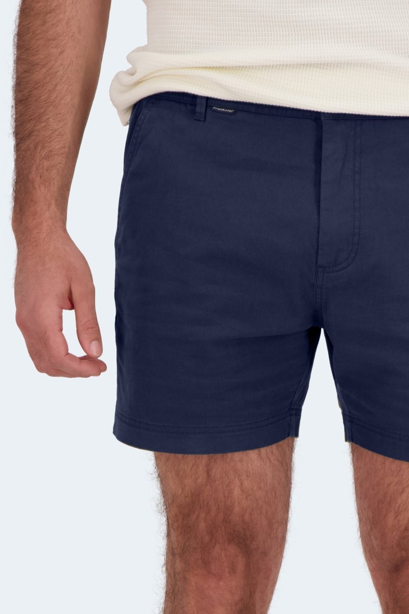 Close-up of Frankster Chillers * The Shorties men's shorts in dark blue stretch cotton showing fit and texture