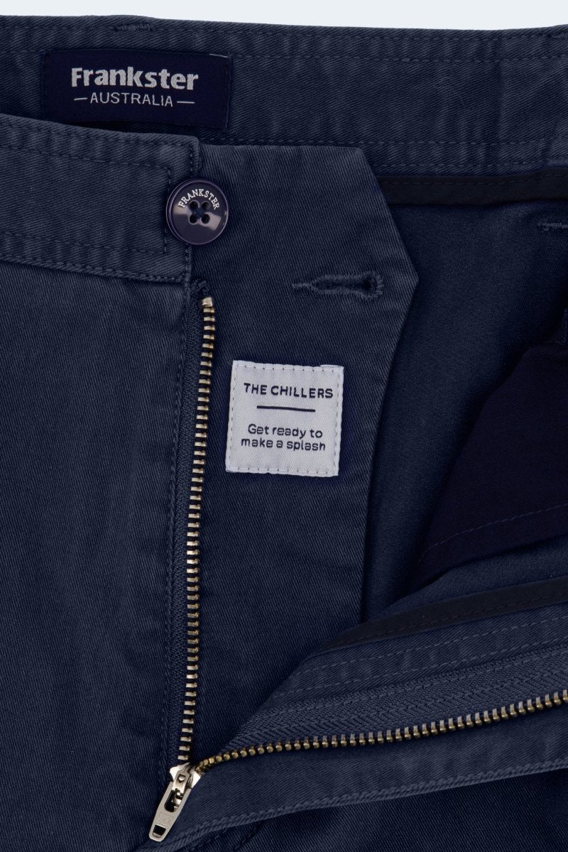 Close-up of Frankster Chillers * The Shorties men's shorts in dark blue stretch cotton with branded button and zipper detail