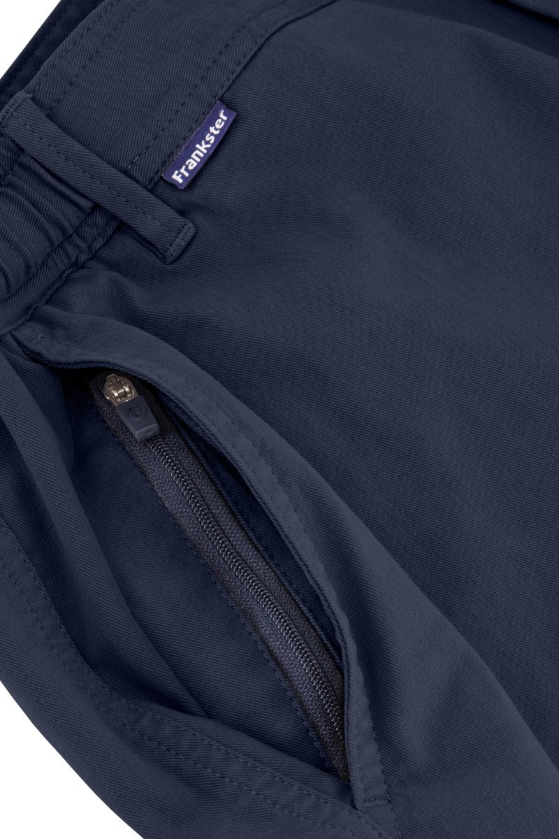 Close-up of dark blue stretch cotton men's shorts with zipper pocket and Frankster label from Chillers * The Shorties collection