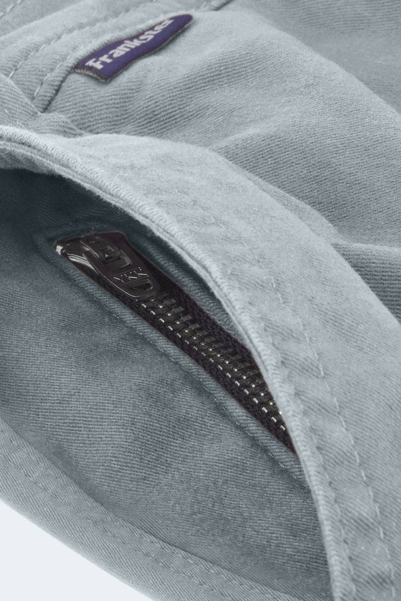 Close-up of Frankster Coastlines * The Everydays men's shorts in blue grey stretch cotton with zipper detail