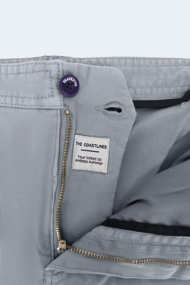 Close-up of Frankster Coastlines * The Everydays men's shorts in blue grey stretch cotton with zipper and button details