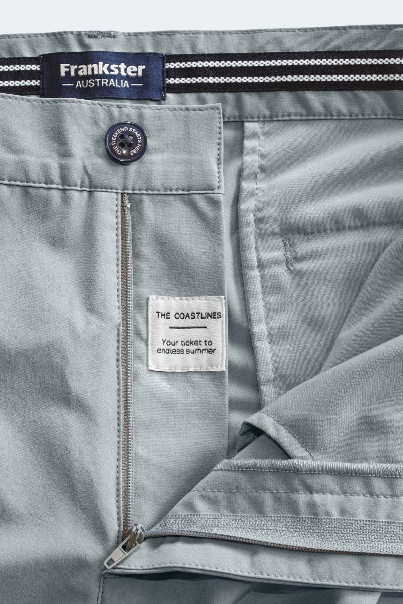 Close-up of Frankster Coastlines * The Actives blue grey lightweight men's shorts with zipper and branded waistband detailing