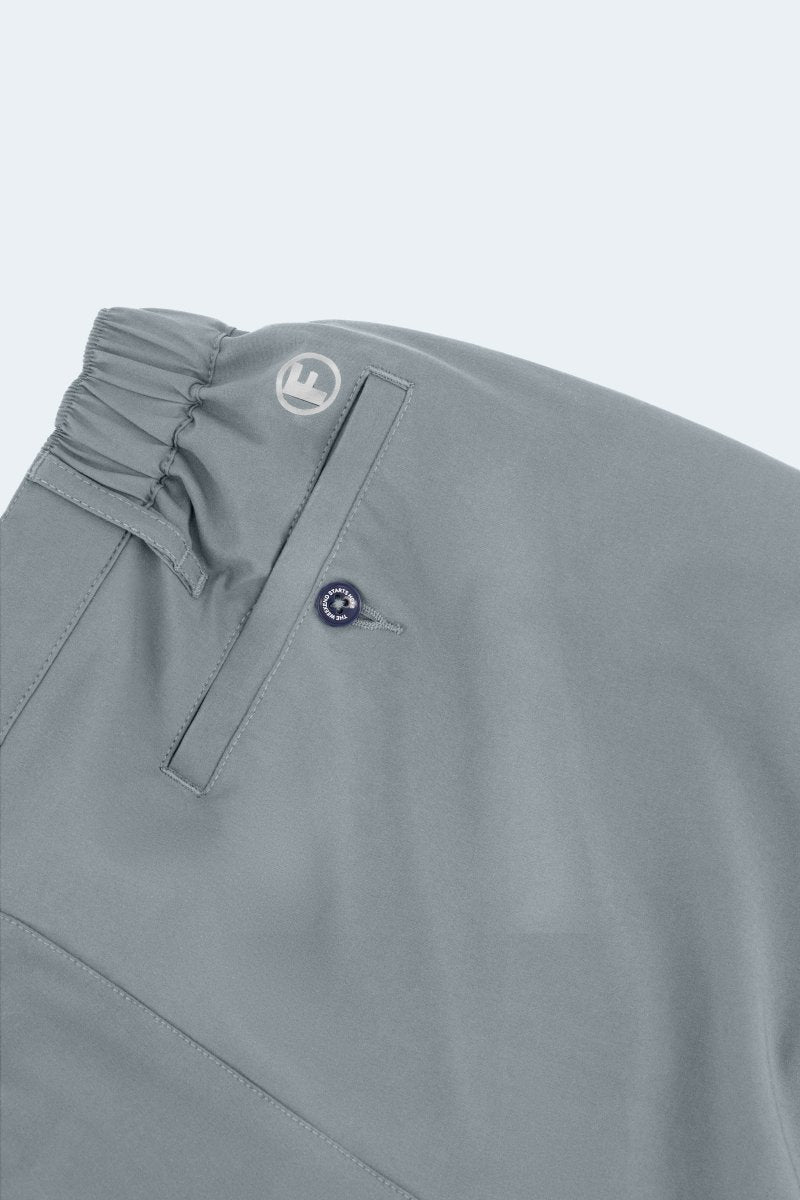 Close-up of Frankster Coastlines * The Actives men's shorts in blue grey lightweight fabric with elastic waistband and back pocket detail