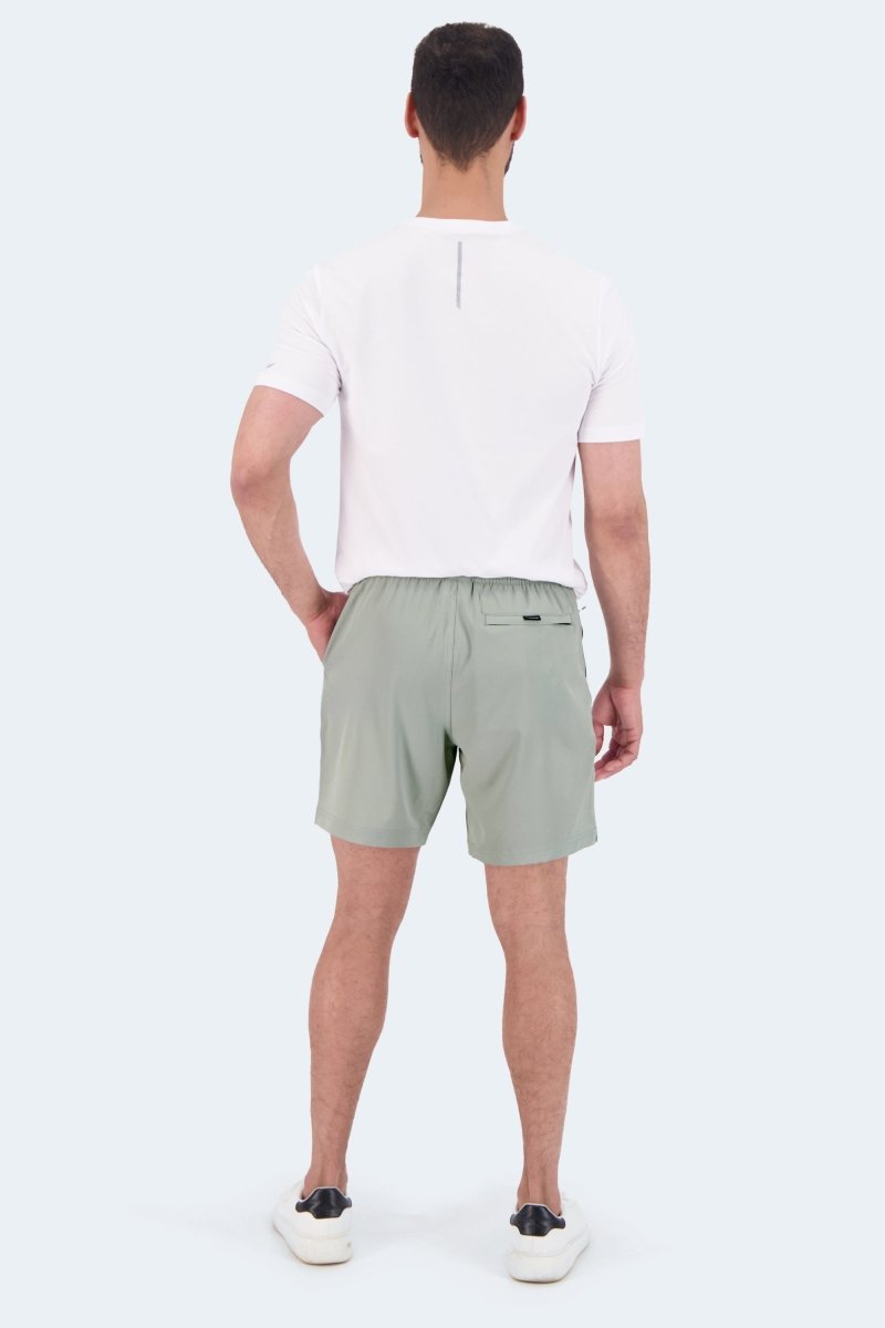 Frankster Evergreens * The Sporties Men's Shorts in sage green with an elasticated waistband and rear zip pocket, shown from the back