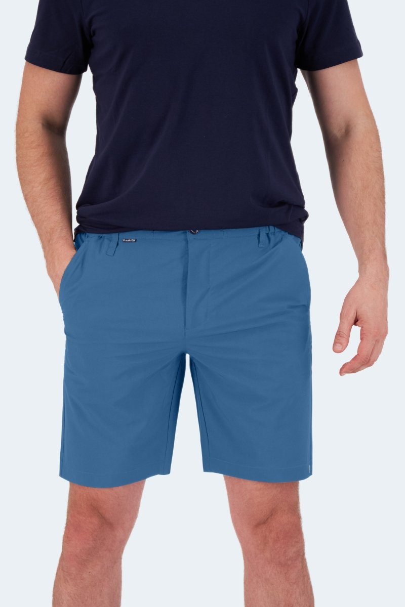 Man wearing Frankster Harbors * The Actives mid blue lightweight men's active shorts with a navy t-shirt