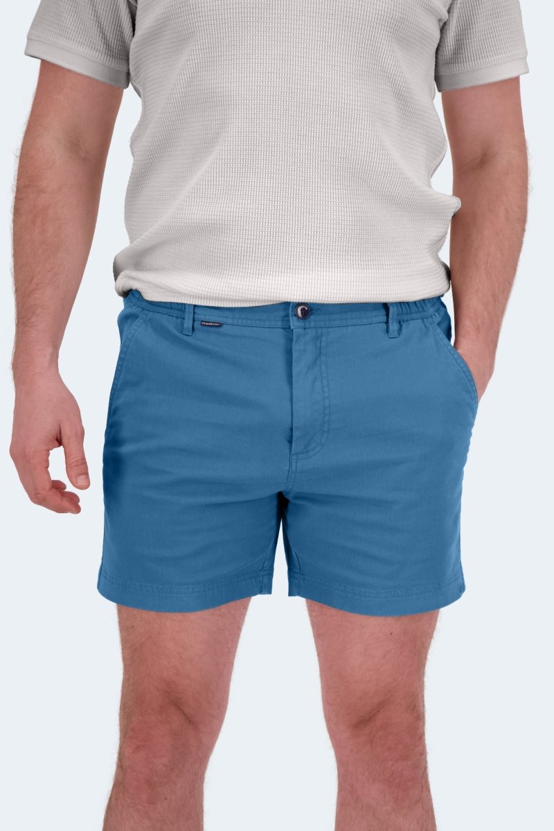 Man wearing Frankster Harbors * The Shorties mid blue stretch cotton men's shorts with pockets and belt loops