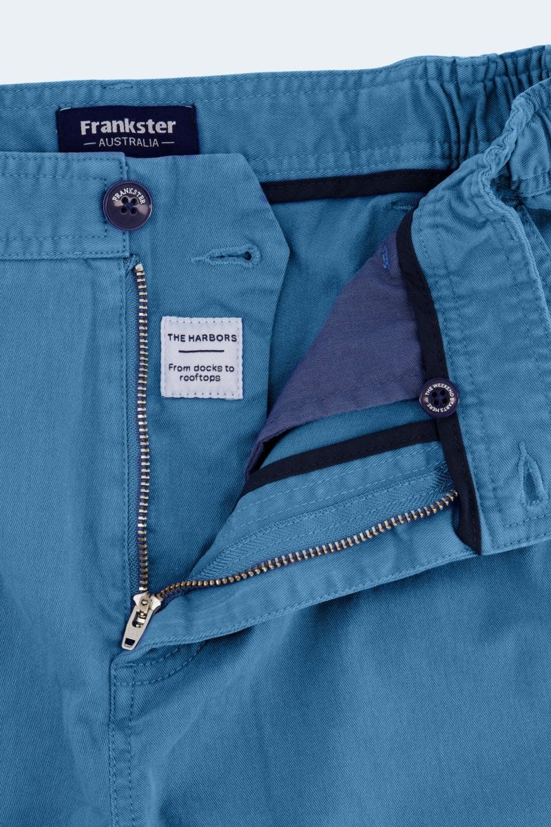 Close-up of blue cotton men's shorts by Frankster showing zipper and button details from Harbors * The Shorties collection