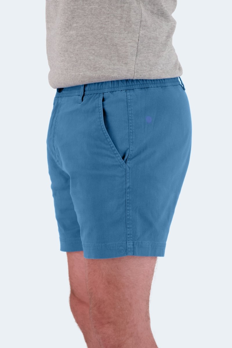 Side view of Frankster Harbors * The Shorties men's shorts in mid blue stretch cotton fabric on model