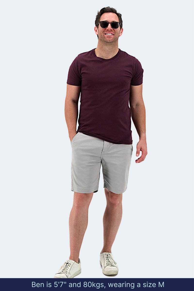 Man wearing Frankster Lunars * The Everydays light grey stretch cotton men's shorts with casual t-shirt and sneakers