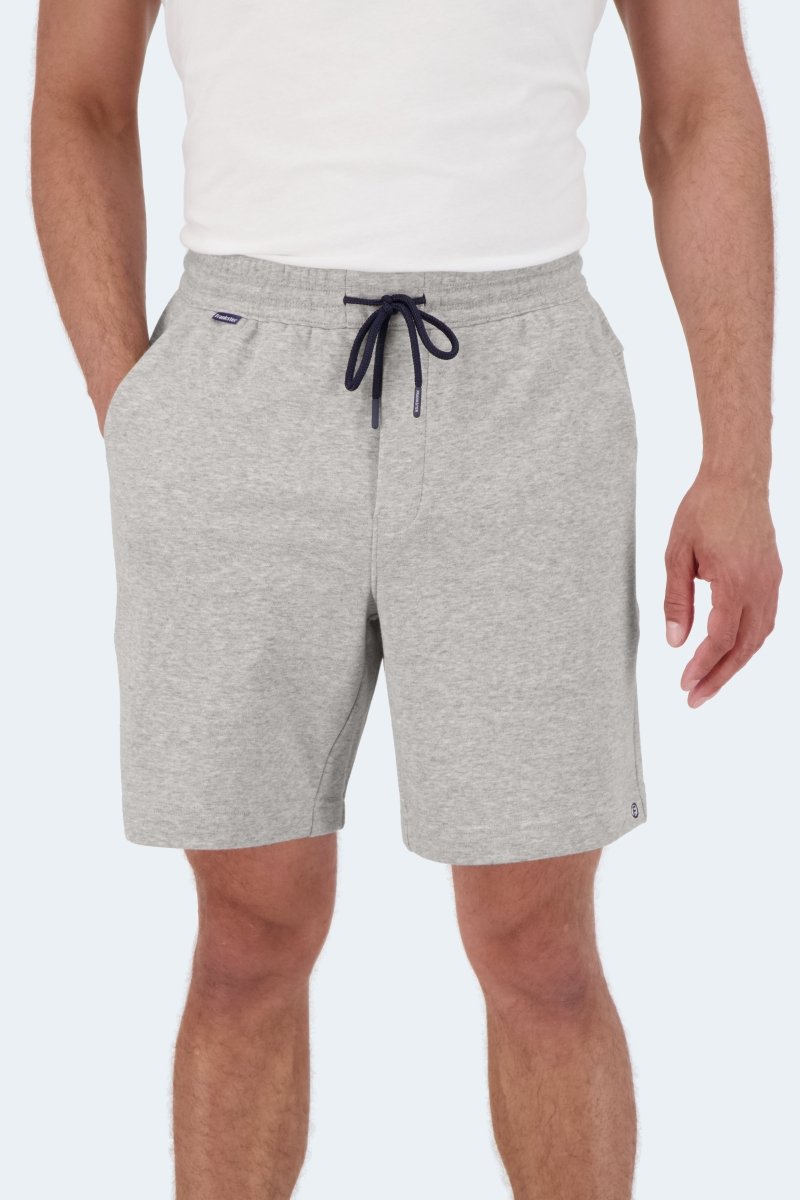 Man wearing Frankster Lunars * The Comfies light grey cotton men's shorts with drawstring waist and side pockets