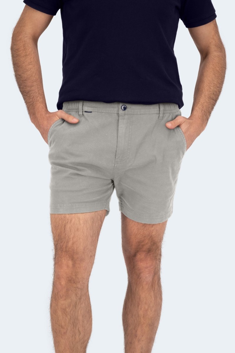 Man wearing Frankster Lunars * The Shorties light grey stretch cotton men's shorts with hands in pockets