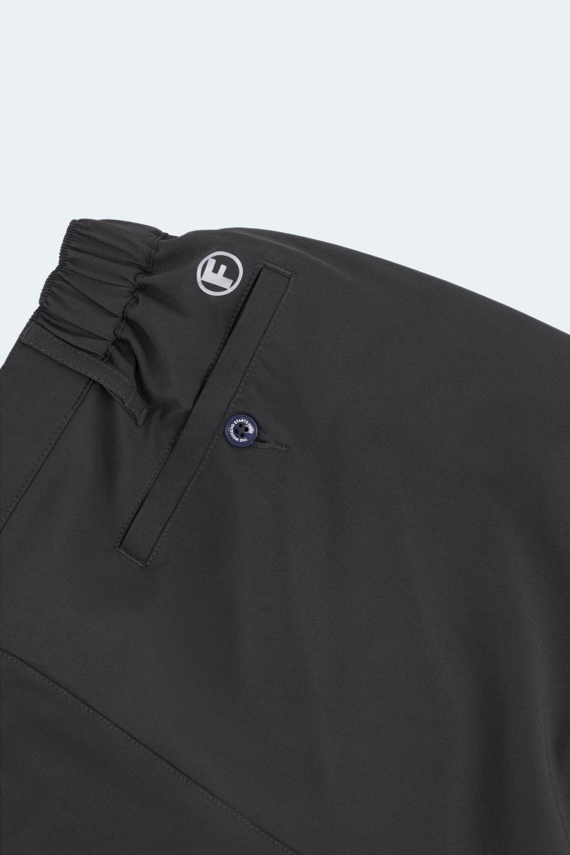 Close-up of Frankster Midnights * The Actives men's shorts in black lightweight fabric with elastic waistband and pocket detail