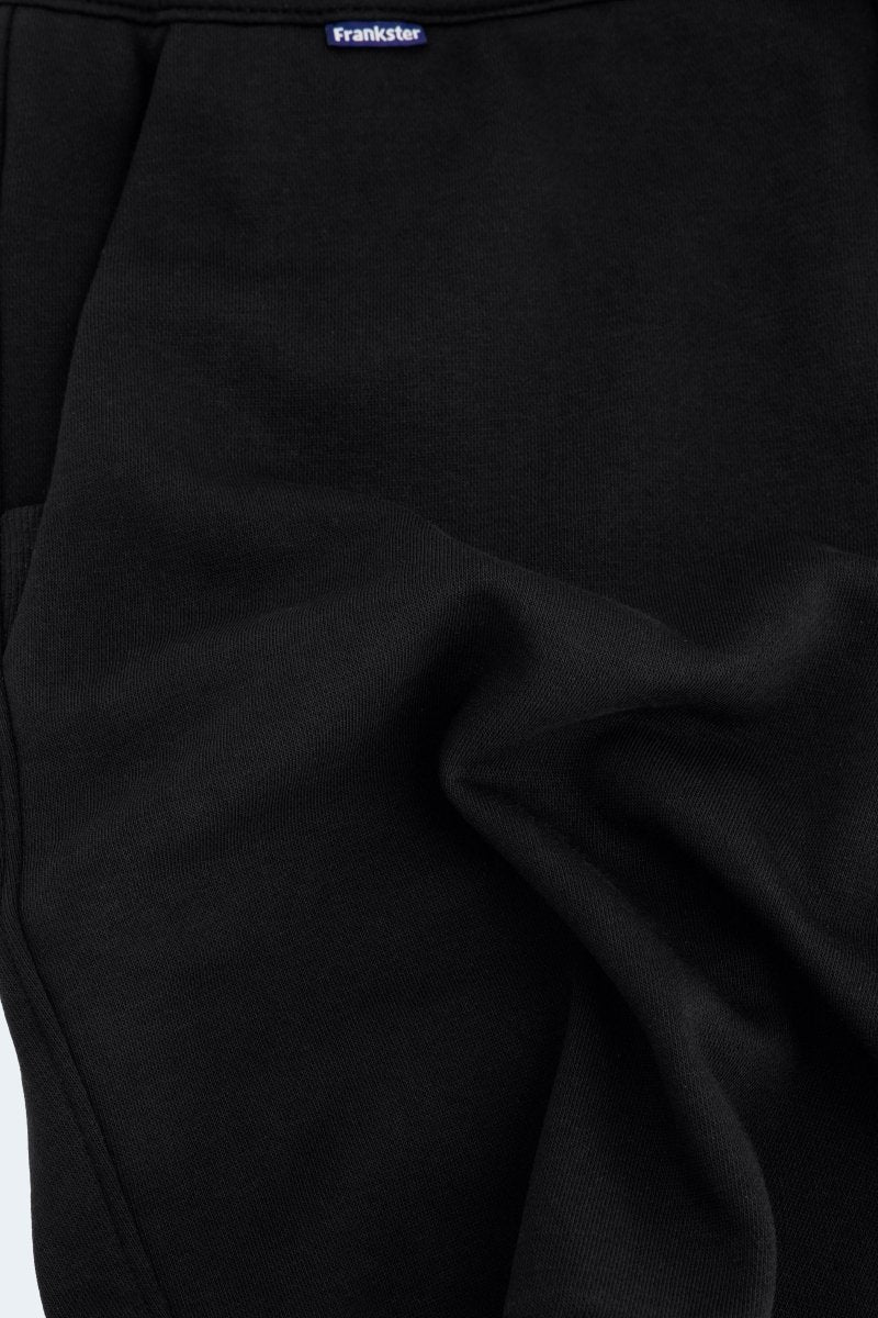 Close-up of black cotton midnights * The Comfies men's shorts by Frankster with soft textured fabric detail