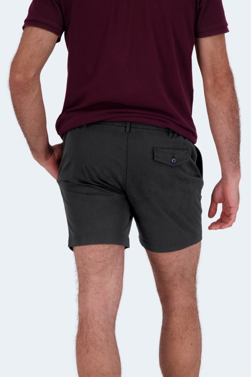 Man wearing Frankster Midnights * The Shorties black stretch cotton men's shorts with back pocket detail