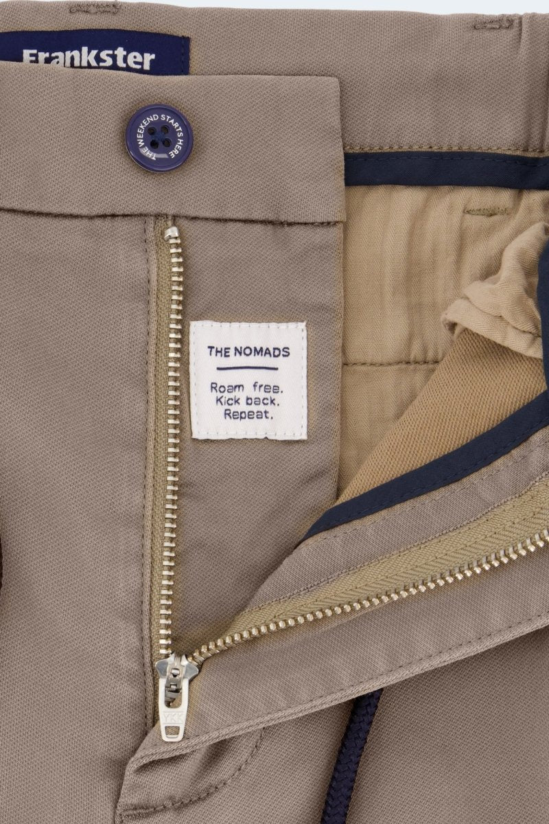 Close-up of Frankster Nomads * The Aussies men's shorts in dark khaki cotton with zipper and branded button detail