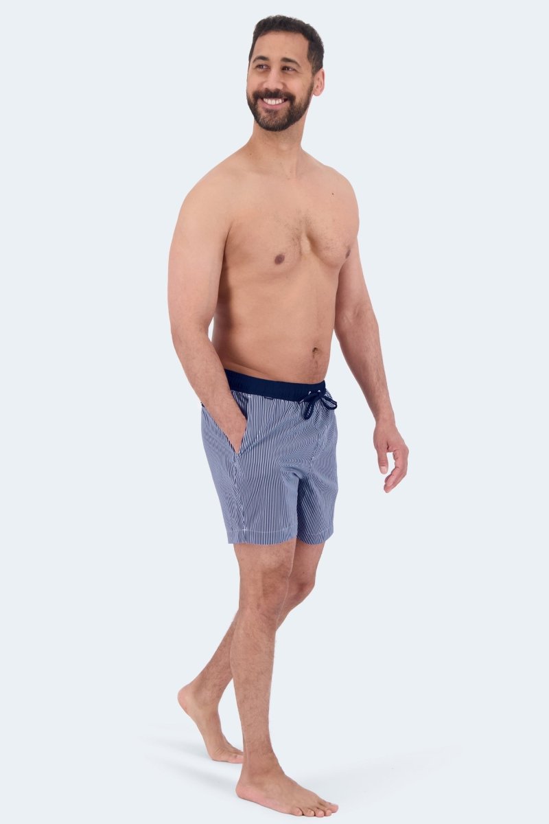 Frankster Poolsiders * The Swims Men's Shorts in blue striped fabric modelled for a relaxed swimwear look