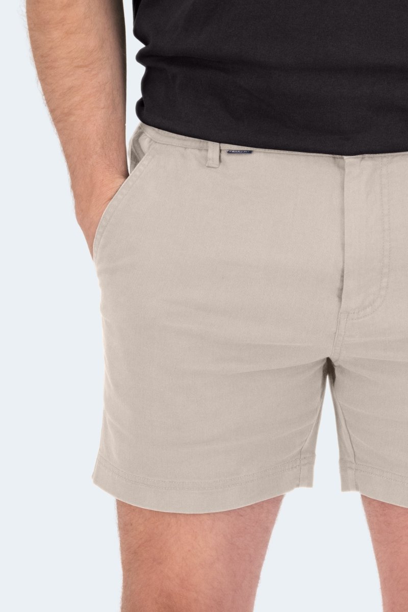Close-up of light khaki Shores * The Shorties men's shorts by Frankster made from stretch cotton fabric with side pockets
