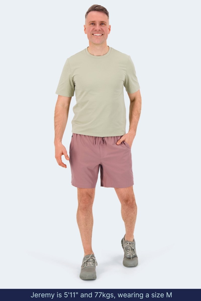 Frankster Sundowners * The Sporties Men's Shorts in muted pink fabric with an elastic waistband and hidden zip pocket