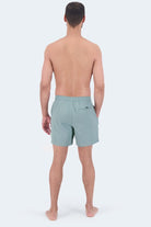Frankster Velvets * The Swims Men's Shorts in pale blue swim fabric with an elastic waistband and hidden zip pocket shown from behind