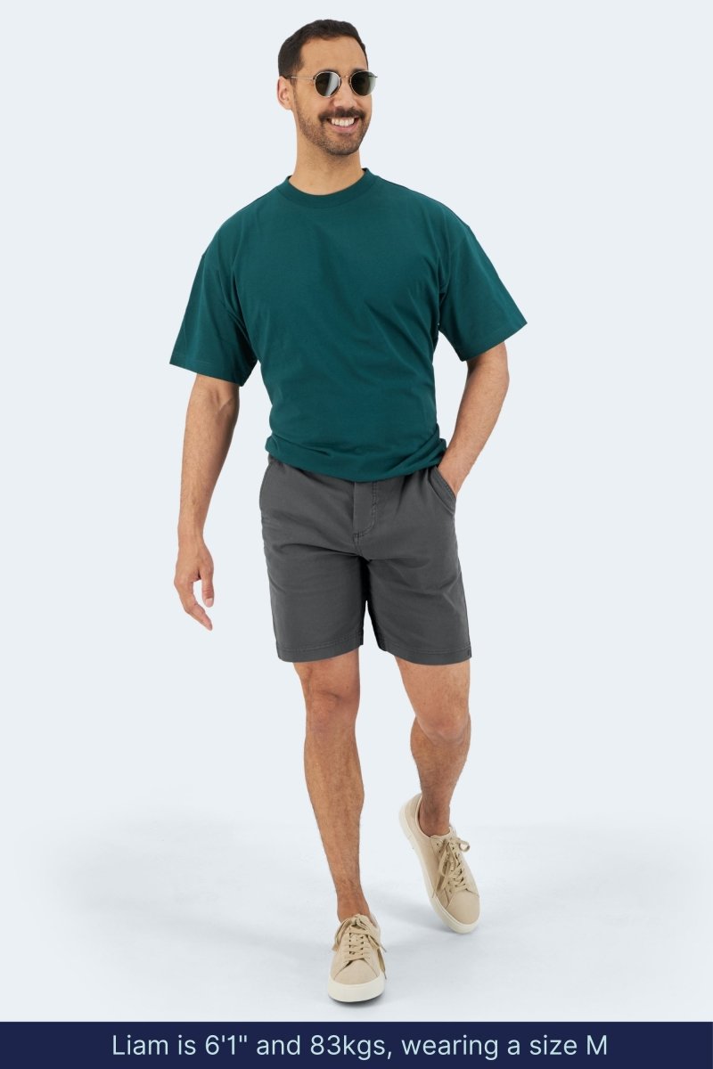 Man wearing dark grey Frankster Volcans * The Everydays men's shorts made from cotton with a relaxed fit and casual style