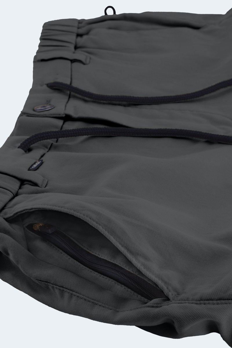 Close-up of Volcans * The Aussies dark grey Frankster men's shorts made from premium fabric with zippered pocket detail