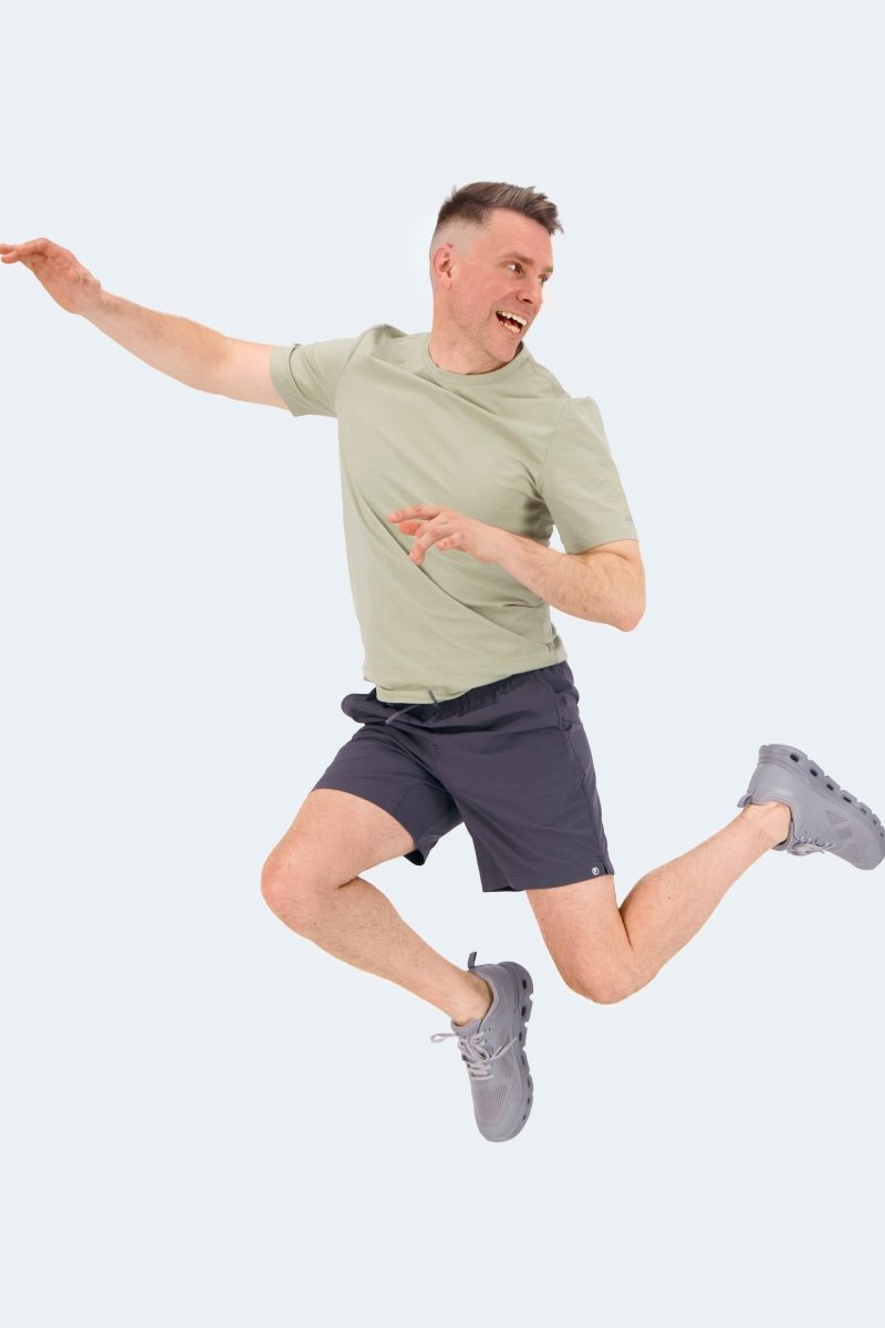 Volcans * The Sporties by Frankster, dark navy Men's Shorts and Shorts for Men in comfortable fabric, model shown jumping