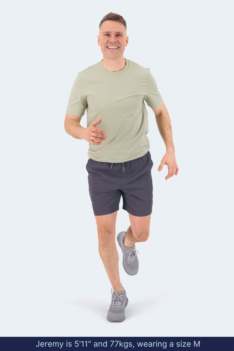 Frankster Volcans * The Sporties Men's Shorts in dark navy, model wearing comfortable mens shorts for active everyday wear