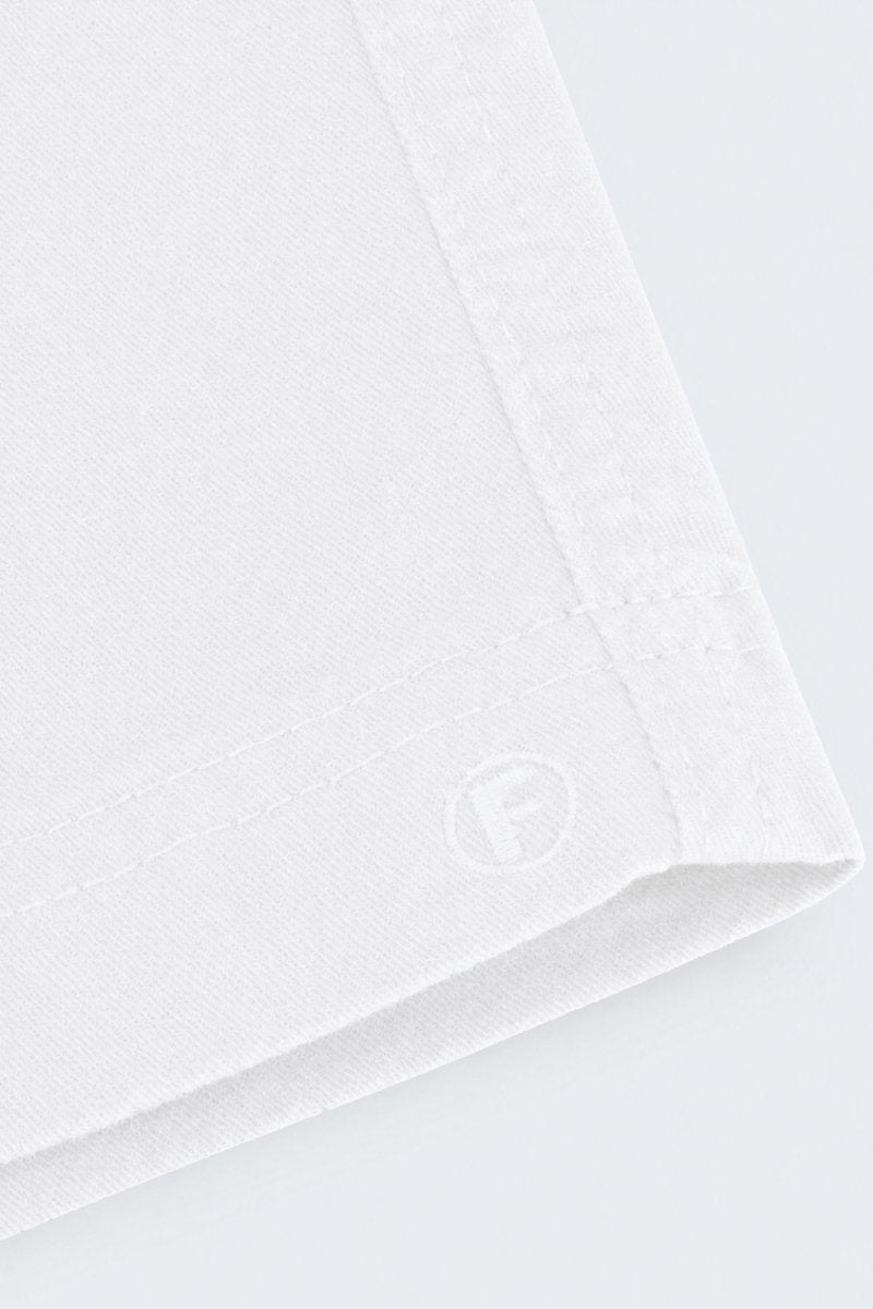 Close-up of white fabric detailing on Whitecaps * The Everydays men's shorts by Frankster, showcasing soft, durable material ideal for all-day comfort.